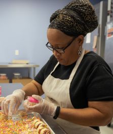 Female employee working in a kitchen